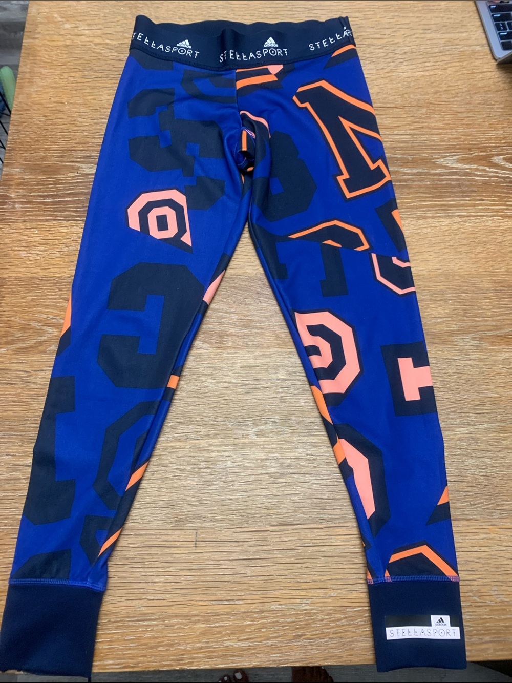 Stylish Adidas by Stella McCartney woman’s Blue & Orange Graphic Leggings